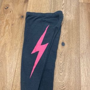 Aviator Nation charcoal with neon pink lightning bolt sweatpants. Kids size 14